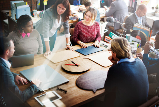 Our team discussing temp agency marketing